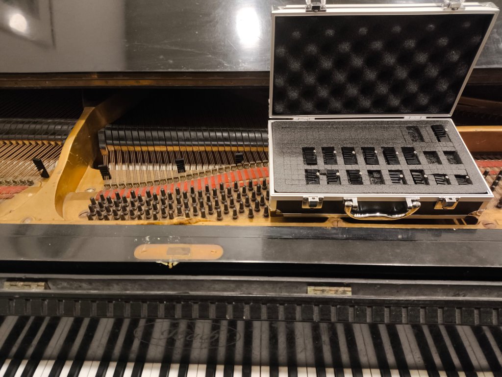 Grand piano fitted with adapters